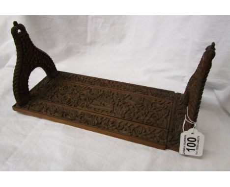 Early 20th century heavily carved Indian sandalwood book pull/trough
