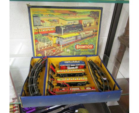 Boxed tin plate & clockwork train set by Wells Brimtoy