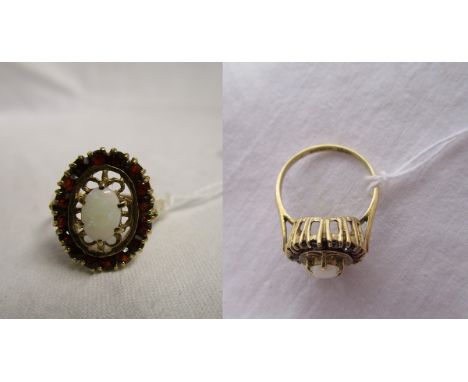 Gold opal and garnet ring