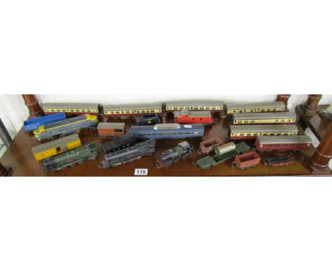 Shelf of model locomotives, carriages etc to include Tri-ANG