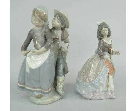 TWO LLADRO PORCELAIN MODELS a girl being teased by a boy in ladies hat and a girl with medieval dress and sword