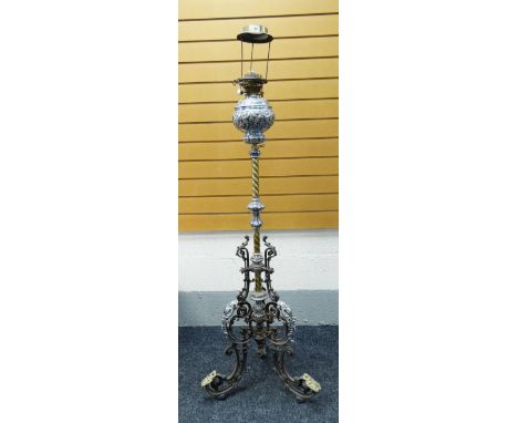 HIGHLY ORNATE METAL OIL LAMP STANDARD with scroll and foliate tripod feet, the column with brass and white metal, the bowl wi
