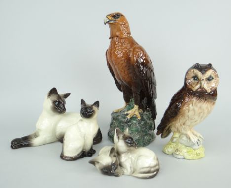 FIVE CERAMIC ANIMAL MODELS comprising Royal Doulton Golden Eagle Decanter for Whyte &amp; Mackay 1984, similar Short Eared Ow