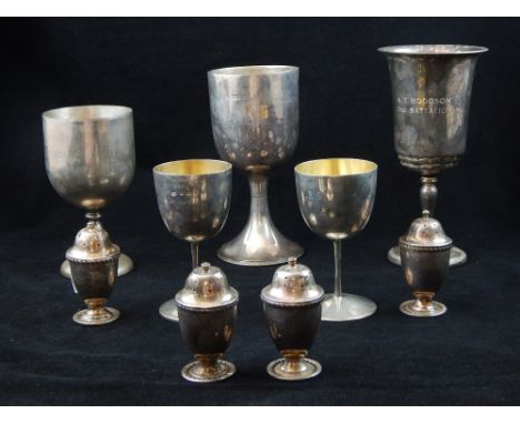 Pair of hallmarked silver goblets with gilt interior bowl, a set of four hallmarked silver pepperettes, a hallmarked silver t