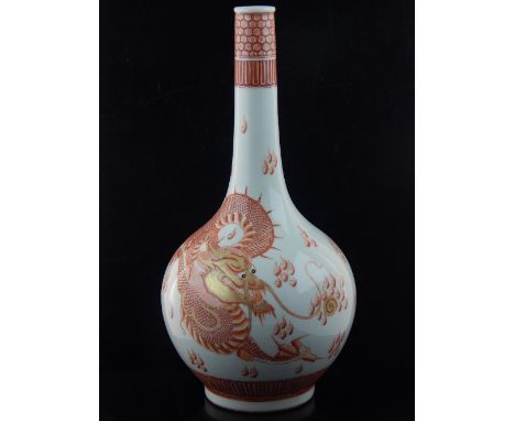 Chinese stem bottle vase, decorated with four claw dragon chasing a flaming golden pearl, six blue ink character marks and ri