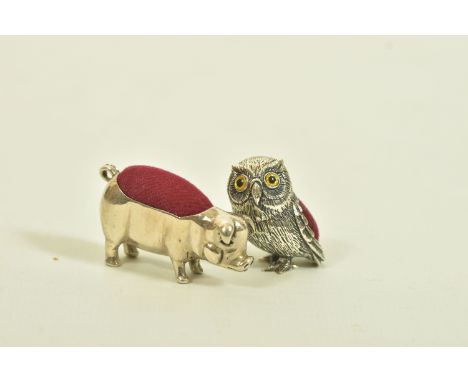 TWO NOVELTY PIN CUSHIONS, the first designed as an owl with paste set eyes, length 30mm, owl stamped sterling, pin stamped 92
