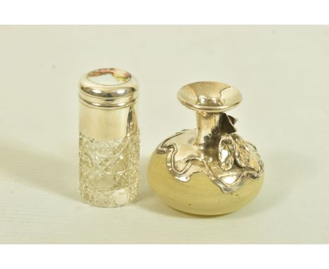 TWO GLASS SCENT BOTTLES, the first an Edwardian silver and moulded textured glass cylinder with enamelled ladies portrait to 
