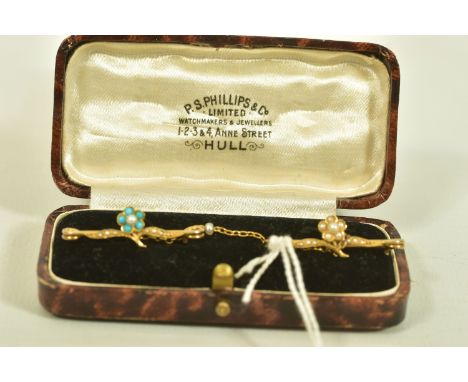 AN EARLY 20TH CENTURY CLOAK CLIP, designed as two floral brooches, one set with seed and split pearls, one set with turquoise
