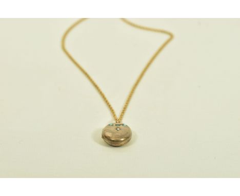 AN EARLY 20TH CENTURY LOCKET AND MODERN CHAIN, the oval shaped locket set with turquoise and replacement blue paste cabochons