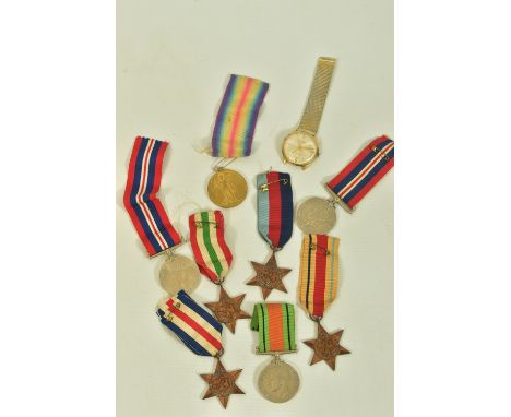 A GROUP OF MEDALS AS FOLLOWS, WW1 Victory medal named M-353149 Pte T Robinson A.S.C, together with the following loose WW2 me