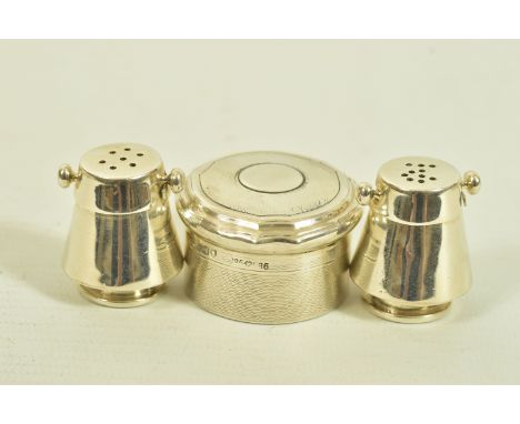 A PAIR OF NOVELTY SALT AND PEPPER POTS, TOGETHER WITH AN EARLY 20TH CENTURY SILVER ASPREY &amp; CO. PILL BOX, the first desig