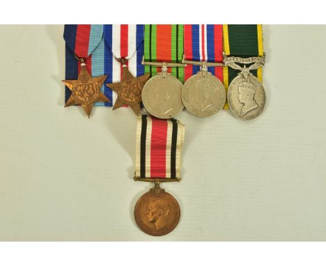 A GROUP OF FIVE MEDALS ON A WEARING BAR AS FOLLOWS, 1939-45, France &amp; Germany Stars, Defence &amp; War medal, together wi