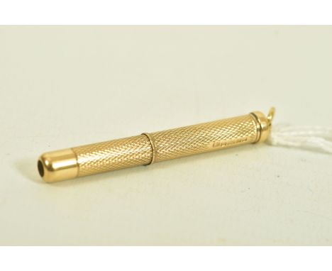 A 9CT GOLD RETRACTABLE TOOTHPICK, engine turned design, hallmarked 9ct Birmingham 2008, measuring 50mm when retracted to 75mm