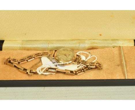 A MID 20TH CENTURY 9CT GOLD ROTARY MANUAL WIND WRISTWATCH, white dial with Arabic numeral markers, calibre.880 movement, appr