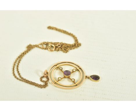 AN EDWARDIAN 9CT GOLD AMETHYST AND SPLIT PEARL PENDANT, designed as an openwork target set with circular cut amethyst and fou