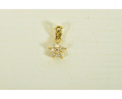 A YELLOW METAL DIAMOND FLORAL PENDANT, designed as a single cut diamond flower, suspended from an openwork tapered surmount, 