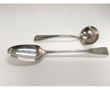 A Georgian silver ladle and an 18th Century basting spoon (2).