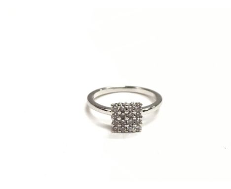 An 18ct white gold ring set with sixteen diamonds, approx 2.6g and approx size K.