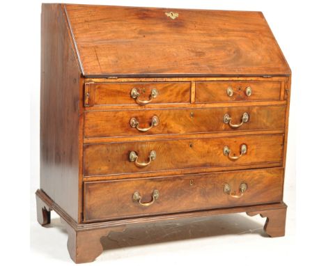 A large &nbsp;late 18th century &nbsp;George III mahogany bureau desk of typical form having a fall front bureau section whic