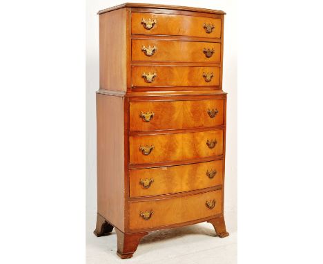 A 1940s 20th century George III style mahogany tallboy / chest on chest of drawers having a flared top atop a bank of six dra