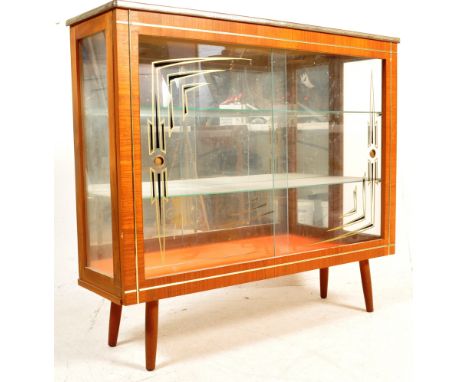 A retro vintage mid 20th century 1950s china display bookcase cabinet vitrine having a flared top with glazed sliding door op