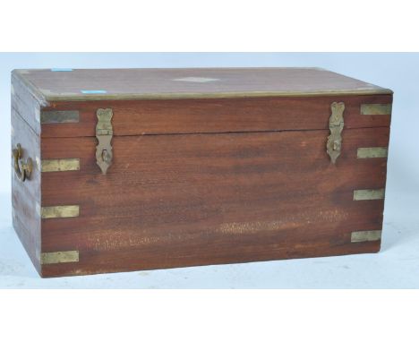 A 19th century Victorian mahogany and brass banded tea caddy having a hinged lid opening to reveal a spacious interior. 30cm 