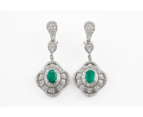 A PAIR OF DIAMOND AND EMERALD SET DROP EARRINGS, BOXED (2)With central oval cut emerald measuring 8.22mm x 8.23mm, claw set a