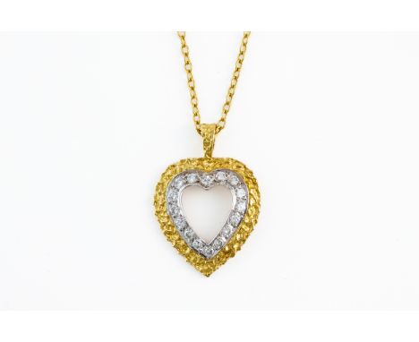 A DIAMOND HEART PENDANT NECKLACE, BOXED (2)Set with sixteen round brilliant diamonds in a bicolour heart outline, hallmarked 