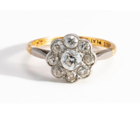 A GOLD AND PLATINUM DIAMOND CLUSTER RING, BOXEDMounted with the principal old cut diamond at the centre, in a surround of eig