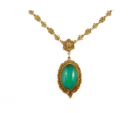 ATTRIBUTED TO RICHARD LLEWELLYN RATHBONE: A JADE NECKLACEWith oval cut jade cabochon set in a scrollwork mount, integrated on