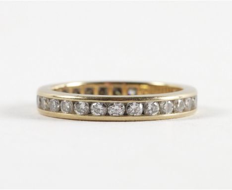 A TIFFANY AND CO 18CT GOLD AND DIAMOND FULL ETERNITY RINGChannel set with round brilliant cut diamonds, detailed Tiffany and 