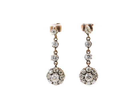 A PAIR OF OLD CUT DIAMOND CLUSTER DROP EARRINGSWith floral cluster design suspended from a drop of three old cut diamonds, al