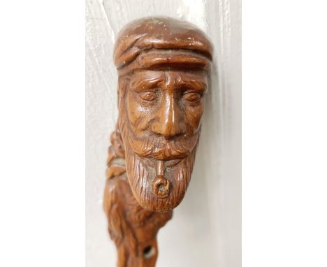 A folk art walking stick, decorated figures, 90 cm Provenance: Part of a single owner collection of walking sticks and relate