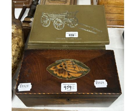A 19th century mahogany tea caddy, with shell inlay, 26 cm wide and a set of eight brass plaques, decorated vintage carts, 24