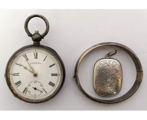 A silver open face pocket watch, a silver bangle, and a vesta (3)