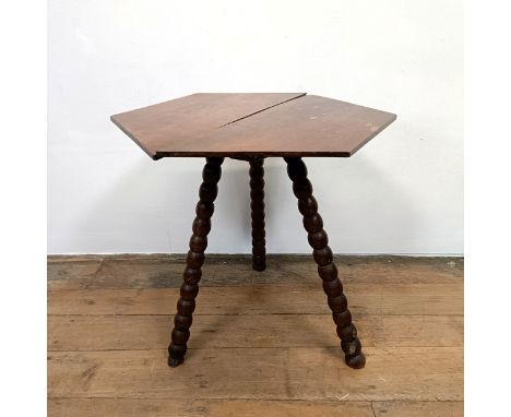 A gypsy table, the hexagonal top on bobbin turned legs