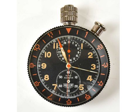 HEUER; a rare Super Autavia chronograph manual stop watch, the black dial set with Arabic numerals and two subsidiary dials, 