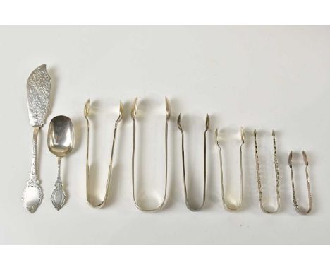 GEORGE UNITE; a Victorian hallmarked silver caddy spoon, with chased decoration, Birmingham 1871, six pairs of hallmarked sil