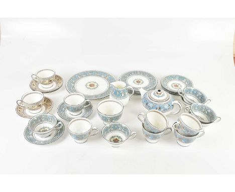 WEDGWOOD; a part tea service in the 'Blue Florentine' pattern, also two tea cups and three saucers in the brown florentine pa