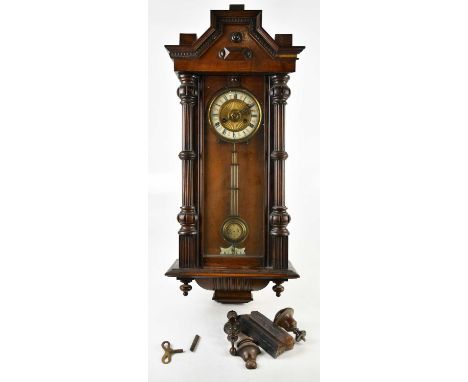 A Victorian eight day striking mahogany cased wall clock, with white enamel chapter ring set with Roman numerals, height 80cm