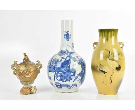 A late 19th century Chinese blue and white porcelain bottle vase decorated with figures and objects, bearing four character K