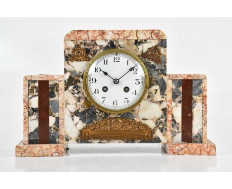 An Art Deco marble mantel clock, with bronzed metal applied cabochons surrounding the enamel dial set with Arabic numerals, h