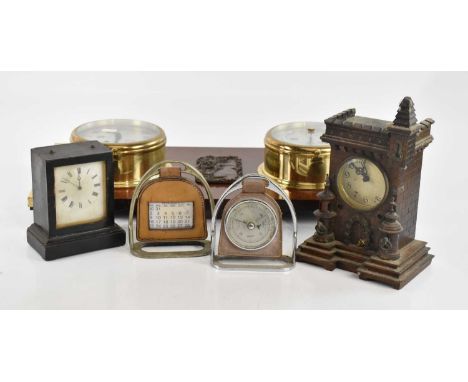 A late Victorian French ebonised mantel clock, the dial set with Roman numerals, the case back stamped 'VAP Brevete', a Black