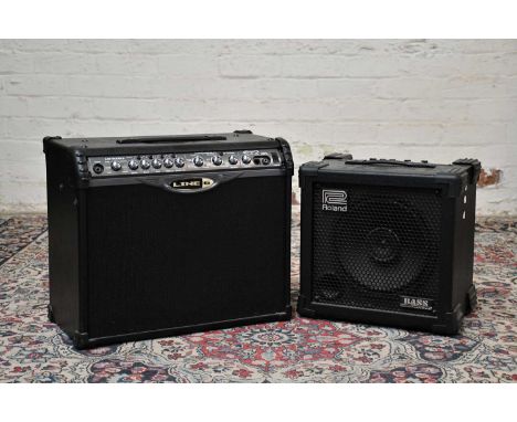 ROLAND; a Cube 30 bass amplifier together with a Line 6 75 watt Spider II guitar amplifier.