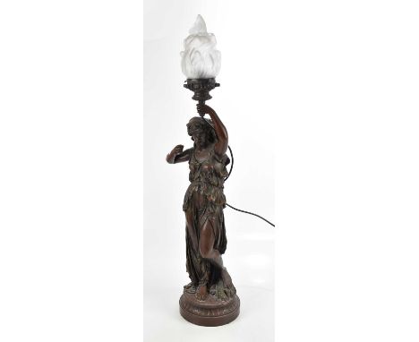 A resin figure of a maiden, with glass shade, height 100cm.Condition Report: The item or items in this lot are sold as decora
