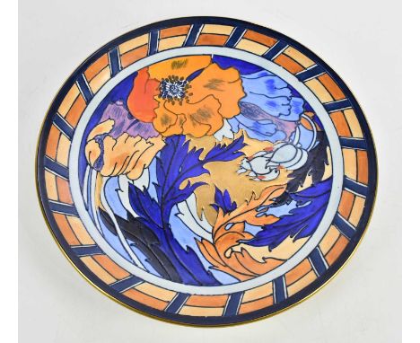 WOOD &amp; SONS; a Frederick Rhead decorative floral wall charger, diameter 41cm.Condition Report: Crazing and scratches thro