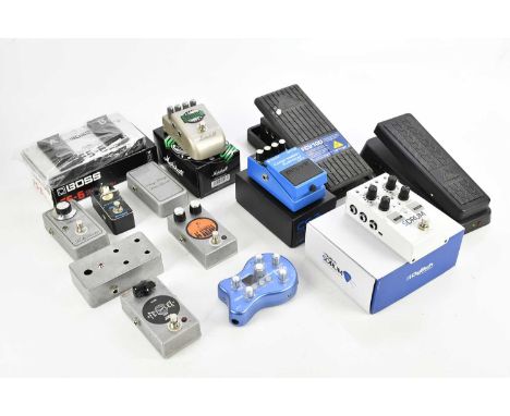 A collection of effects pedals, comprising of Behringer FCV100, Bheringer Hellblade, Digitech Sdrum, Boss CS-3, Marshall Rege