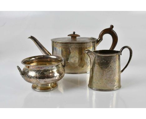 HENRY STRATFORD; a Victorian hallmarked silver two piece tea service of oval form, comprising teapot with turned wooden handl