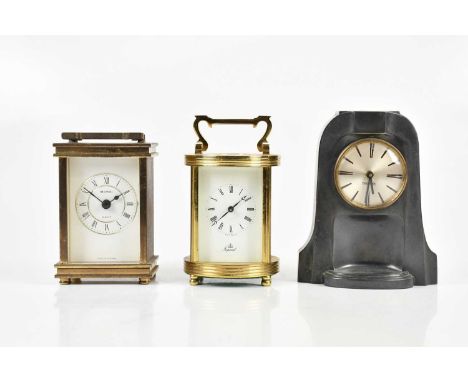 IMPERIAL; a brass cased drum shaped carriage clock, the enamel dial set with Roman numerals, height 15cm, a Metamec carriage 