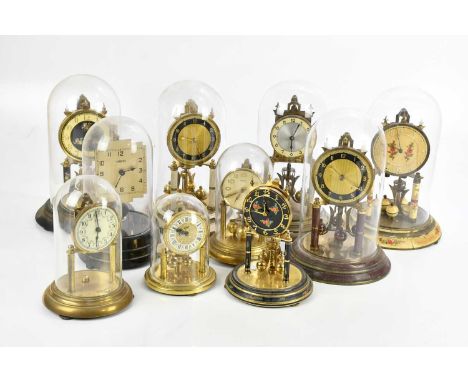 TEMPEX; an electric mantel clock, the applied Art Deco style face set with Arabic numerals, on black stepped base with dome, 